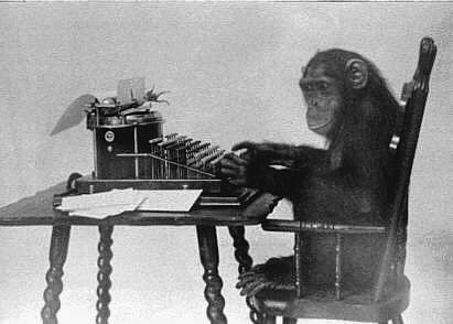 Chimpanzee at a typewriter. Via Wikimedia Commons.